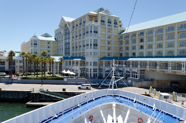 The bow of the Silver Wind, and the Table Bay hotel in the background. Cruise ship docks don't get much closer than this! Photo © 2013 Aaron Saunders