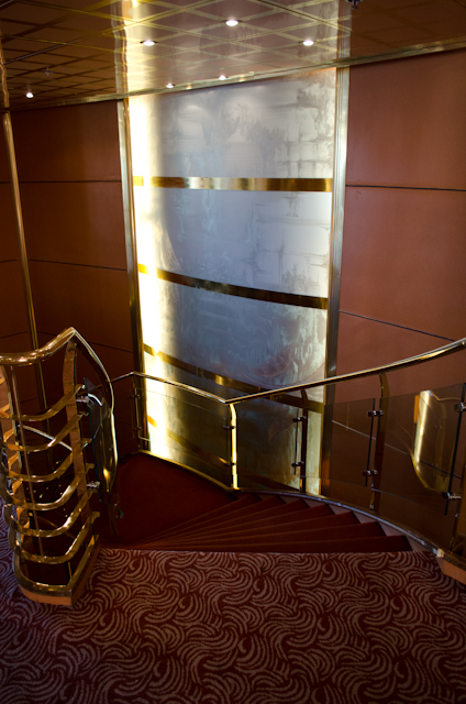 Silver Wind has dual spiral staircases flanked by a mural running eight stories in height. Photo © 2013 Aaron Saunders