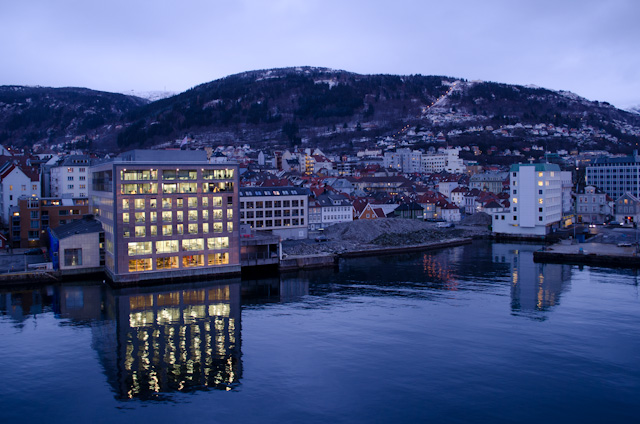 Hurtigruten's Midnatsol bids Bergen farewell as we begin our voyage up Norway's coast - in winter! Photo © 2013 Aaron Saunders
